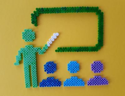 teacher and students made of iron-on beads
