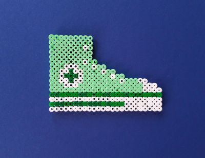sneaker made of iron-on beads