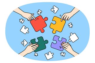 Puzzleteile als Symbolbild für gemeinsame Ideen, die zu einem Ganzen zusammengefügt werden.