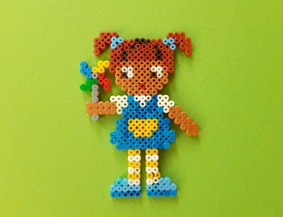 young girl made of iron-on beads